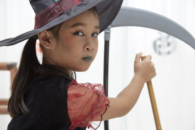 Portrait of cute girl looking away