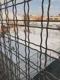 Reflection of sky on puddle