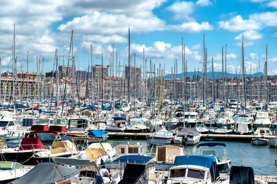 Boats moored at harbor