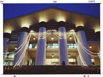 Low angle view of building against blue sky