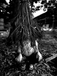 Midsection of woman with umbrella