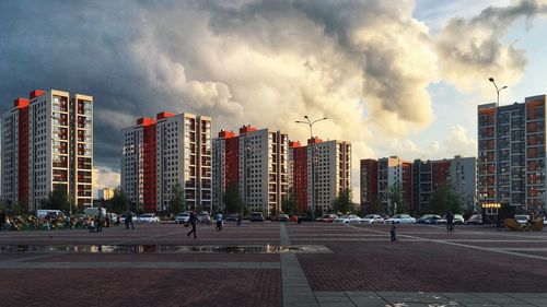 Panoramic view of city buildings against sky