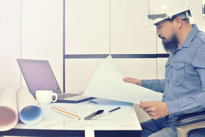 Man working on table