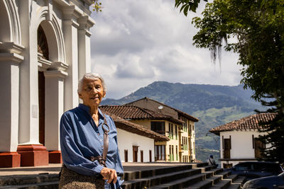 Senior woman tourist at the heritage town of salamina in the department of caldas in colombia