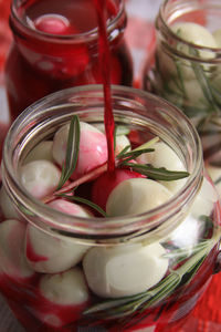 High angle view of ice cream in glass jar on table