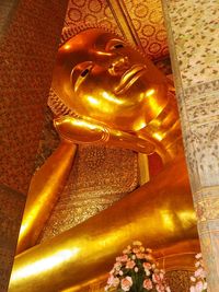 Low angle view of buddha statue