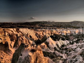 Scenic view of rock formations against sky