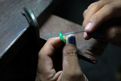 Close-up of hand holding hands