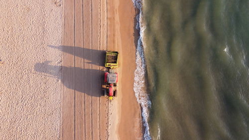 High angle view of tractor on beach
