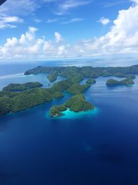 Panoramic view of sea against blue sky