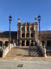 Facade of historic building against blue sky