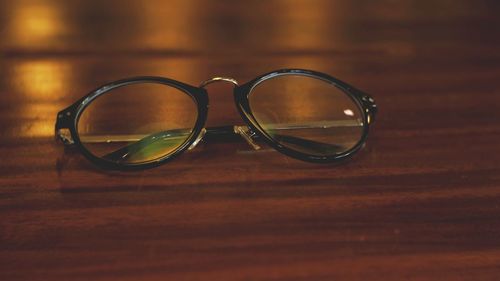 Close-up of eyeglasses on table