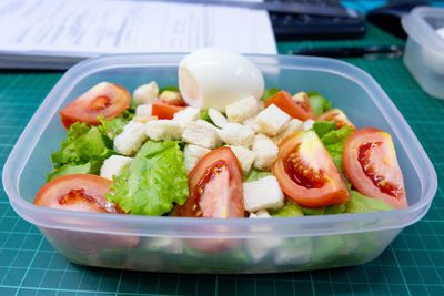 Close-up of chopped vegetables in bowl on table