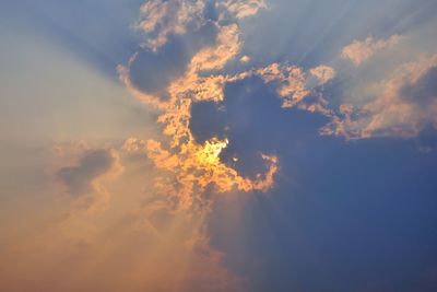 Low angle view of clouds in sky during sunset