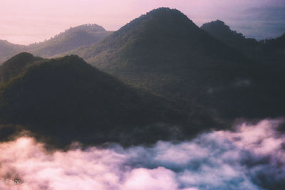 Low angle view of mountains against sky during sunset