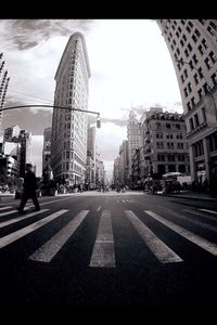 Road along buildings in city