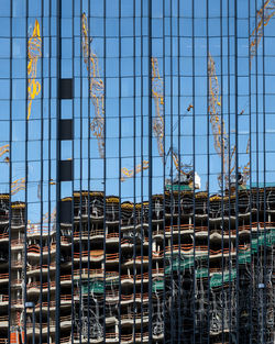 Full frame shot of metallic structure against blue sky