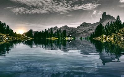 Scenic view of lake with reflection against sky