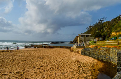 Scenic view of beach against sky