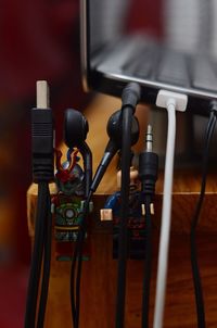 Close-up of computer cables on table