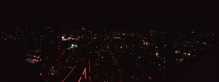 View of illuminated city at night