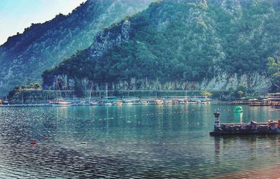 Scenic view of boats in lake