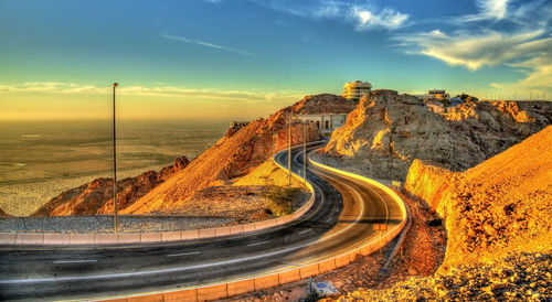 Panoramic view of road against sky during sunset