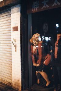 Reflection of man on glass window