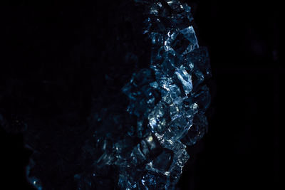Close-up of ice crystals against black background