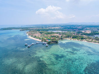 High angle view of sea against cloudy sky