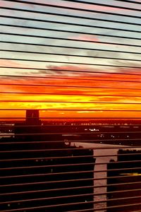 Full frame shot of red lights against sky during sunset