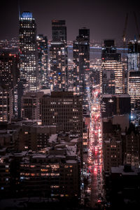 Illuminated cityscape at night