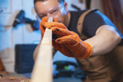 Midsection of man holding hands