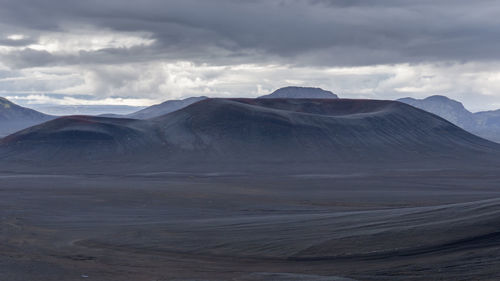 Scenic view of volcanic landscape against sky