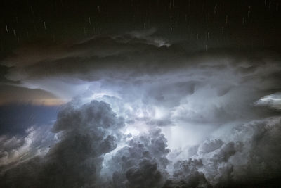 Scenic view of sea against sky at night