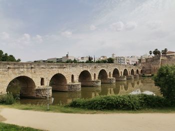 Bridge over river against sky