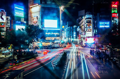 Light trails on city street at night