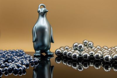 Low angle view of lighting equipment against gray background