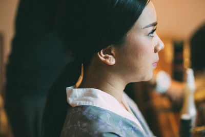 Close-up portrait of young woman