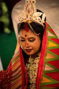 Portrait of woman wearing traditional clothing