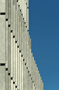 Low angle view of row against the sky