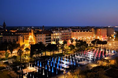 Illuminated cityscape at night