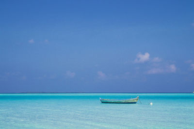 Scenic view of blue sea against sky
