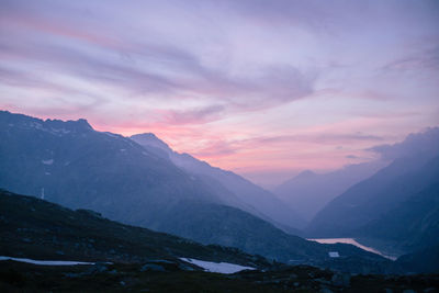 Scenic view of mountains against sky during sunset