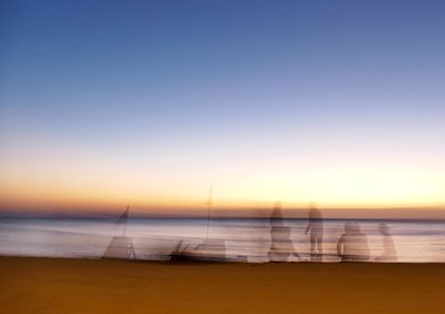 Scenic view of sea at sunset