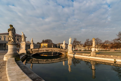 Prato della valle, square in the city of padua with the memmia island surrounded by a canal