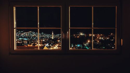 Illuminated christmas tree at night