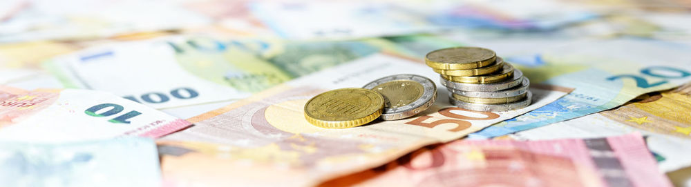 Close-up of coins on table