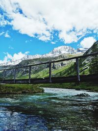 Bridge over river against sky