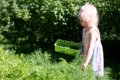 Girl standing in grass